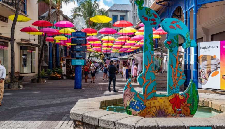 mauritius travel experiences,things to do in mauritius,explore mauritius attractions,adventure activities mauritius,belle mare water sports,deep sea fishing mauritius,le morne brabant hike,grand bassin temples visit,seven coloured earth tour,underwater waterfall helicopter tour