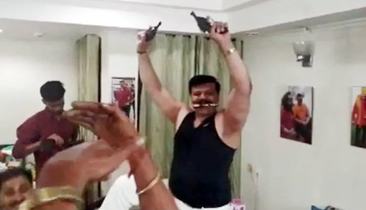 pranav champion,brandishes,arms,party,supporters,bjp,bjp mla