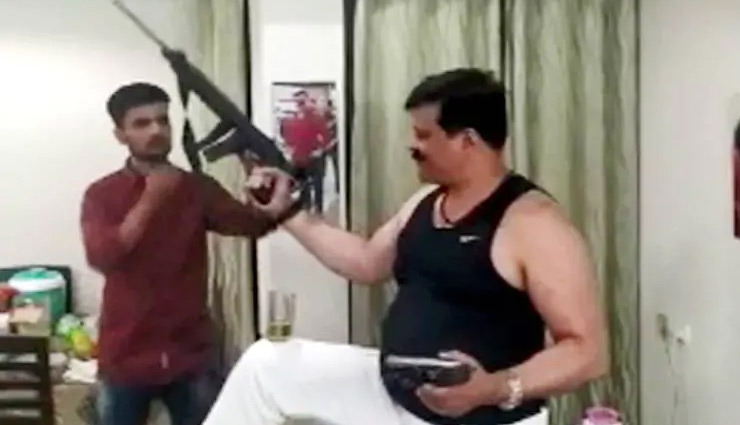 pranav champion,brandishes,arms,party,supporters,bjp,bjp mla