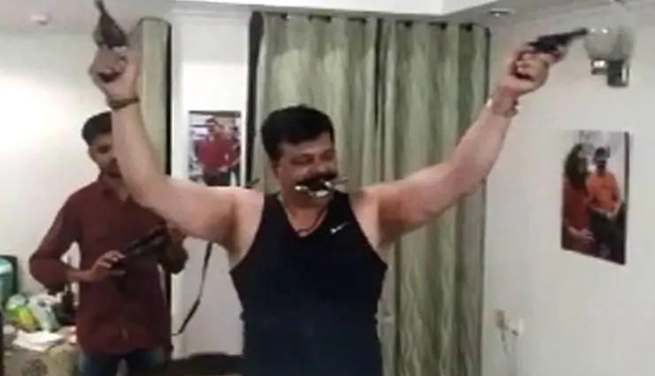 pranav champion,brandishes,arms,party,supporters,bjp,bjp mla