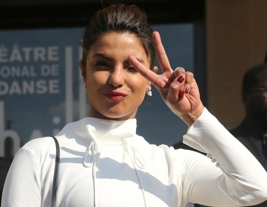 White Dress And Leather Boot- Beat Monsoon in Priyanka Chopra Style