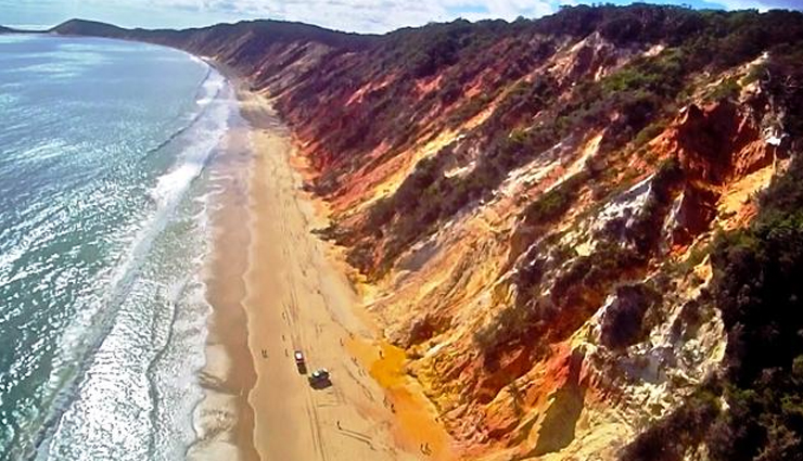 vibrant beaches,colorful beach destinations,unique beach vacations,worlds most colorful beaches,beaches with colorful sands,exotic beach getaways,vibrant coastal destinations,colorful beach escapes,rainbow-colored shores,unusual beach landscapes,traveling to vibrant beaches,stunning beach colors,beaches for a colorful vacation,multicolored sand beaches,beautifully colored coastal spots