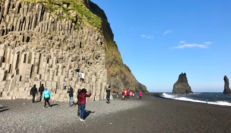 black sand beaches,black sand beaches to visit,10 black sand beaches,black sands beach in whitethorn,ficogrande in stromboli,perissa beach in paralia,santorini,stokksnes beach in iceland,miho beach in shimizu,punaluu beach on the big island of hawaii,anse chastanet in saint lucia,kamari beach in santorini,greece,papenoo beach in papenoo,tahiti,reynisfjara in vík í mýrdal,travel,holidays,travel guide