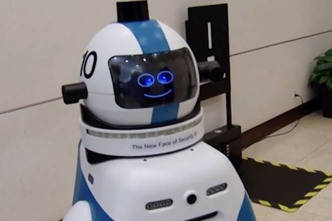 robot gaurd,robot security gaurd,china,residential community,beijing,robot watchman,facial recognition,man-machine communication,patroling,weird story