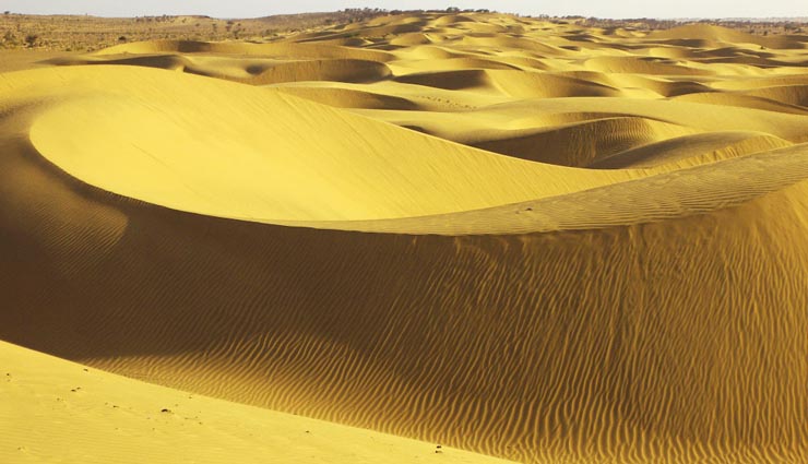 5 most beautiful places in india,hogenakkal falls,sela pass,bhedaghat,sand dunes,jaisalmer,nohkalikai falls,cherrapunji