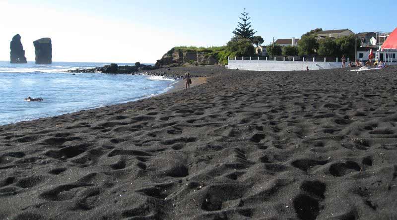 vik beach,iceland,perissa beach,greece,karekare beach,new zealand,black sand beach,hawaii,playa negrita,puerto rico,miho no matsubara,japan,black sands beach,california,kehena beach,hawaii,el tunco,el salvador,sao miguel,portugal,black sand beach in the wolrd,unique beach in the world,black sand beach,beaches around the world