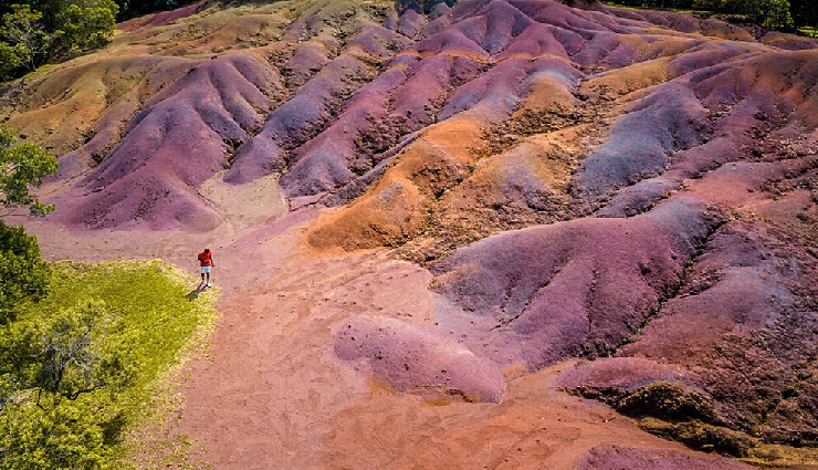 mauritius travel experiences,things to do in mauritius,explore mauritius attractions,adventure activities mauritius,belle mare water sports,deep sea fishing mauritius,le morne brabant hike,grand bassin temples visit,seven coloured earth tour,underwater waterfall helicopter tour