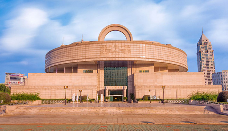 the bund,oriental pearl tv tower,shanghai tower,huangpu river,yu garden,shanghai museum,nanjing road,zhujiajiao water town,shanghai disney resort,jade buddha temple,shanghai,tourist destinations to visit in shanghai,places to visit in shanghai