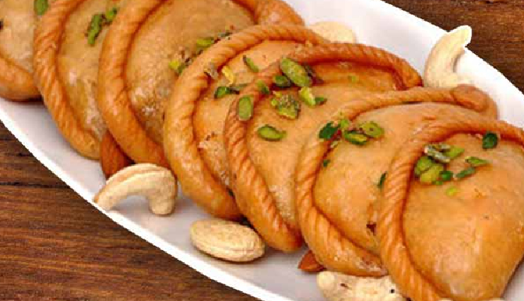 sooji mawa gujiya,holi recipes,indian festive sweets,gujiya recipe,sooji mawa sweets,traditional holi desserts,indian sweet treats,festive gujiya preparation,homemade gujiya recipe,gujiya with semolina and khoya,easy holi sweets,gujiya filling ideas,indian pastry recipes,holi delicacies,sweet dumplings for holi,mawa gujiya stuffing,semolina dessert recipes,festive dessert ideas,authentic indian gujiya,sooji mawa gujiya ingredients