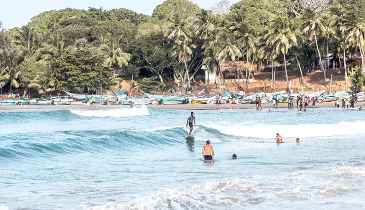 sri lanka,places to visit in sri lanka,tourist attraction in sri lanka,galle fort,unawatuna beach,kandy to ella train,kandy market,nuwara eliya tea plantations,the knuckles mountain range,arugam bay,sigiriya rock fortress