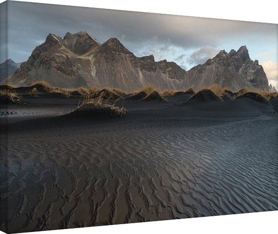 beautiful black sand beaches,black sand beaches,black sand beaches in the world,vik beach,iceland,perissa beach,greece,playa jardín,canary islands,karekare beach,new zealand,stokksnes beach,iceland