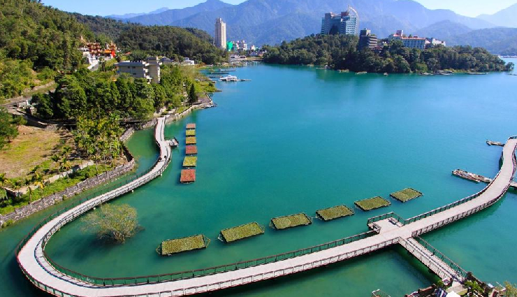 taiwan vacation attractions,taipei 101 observation deck,beitou hot springs,rainbow village nantun,taroko gorge hiking trails,sun moon lake leisure activities,yandmingshan national park,xinshe sea of flowers taichung,lin family mansion and garden,zushi temple architecture,wusheng night market shopping and dining,taiwanese tourist destinations,taiwan sightseeing spots,must-visit places in taiwan,cultural attractions in taiwan