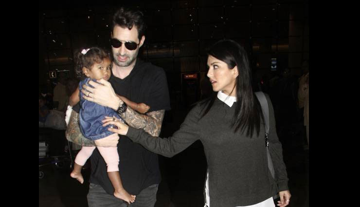 PHOTOS बेटी के साथ एयरपोर्ट पर दिखीं सनी लियोनी sunny leone,nisha,airport,sunny leone pics,sunny leone photos,bollywood
