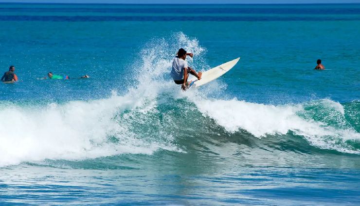 bali travel guide,bali tourism,things to do in bali,explore ubud,tanah lot temple,mount batur hike,bali hot springs,uluwatu temple,surfing in bali,besakih temple,tukad cepung waterfall,sundays beach club,bali swing