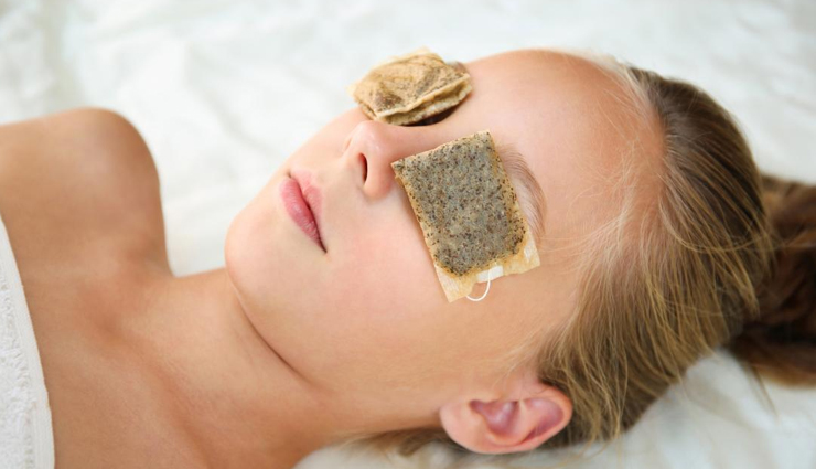 dark circles,home remedies to treat dark circles,eye care,eye care tips,cold tea bags,grated potatoes or grated cucumber,cold milk,elevating the head,aloe vera,almond oil and lemon juice,rosewater,tomatoes,yoga and meditation,beauty,beauty tips
