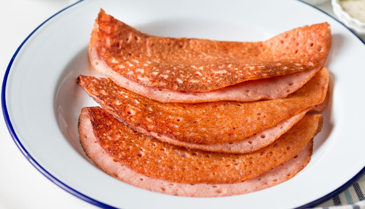 instant tomato dosa recipe,tangy tomato dosa,south indian breakfast recipe,rice flour and semolina dosa,tomato onion mixture dosa,no-fermentation dosa,healthy breakfast option,crispy tomato dosa,tomato dosa variations,dosa with chutney and sambar