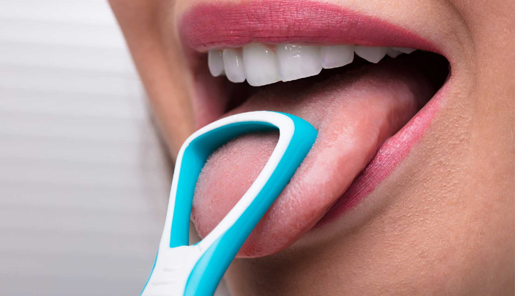 black spots on tongue,lingual melanosis,tongue discoloration,oral hygiene tips,tongue scraping benefits,hydration for oral health,healthy diet for tongue health,natural mouth rinses,oil pulling benefits,tobacco and oral health,probiotics for oral hygiene,tongue health remedies,tongue care tips,causes of black spots on tongue,oral health awareness