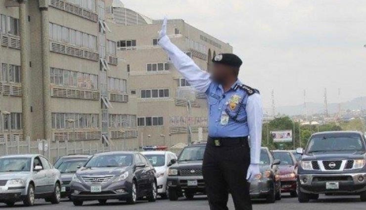 weird news,weird incident,flirty traffic policeman,woman fined for excessive beauty