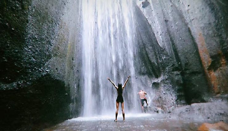 bali travel guide,bali tourism,things to do in bali,explore ubud,tanah lot temple,mount batur hike,bali hot springs,uluwatu temple,surfing in bali,besakih temple,tukad cepung waterfall,sundays beach club,bali swing