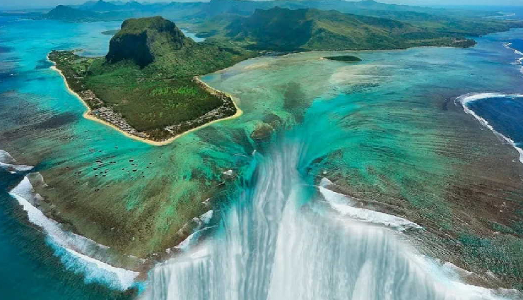 mauritius travel experiences,things to do in mauritius,explore mauritius attractions,adventure activities mauritius,belle mare water sports,deep sea fishing mauritius,le morne brabant hike,grand bassin temples visit,seven coloured earth tour,underwater waterfall helicopter tour