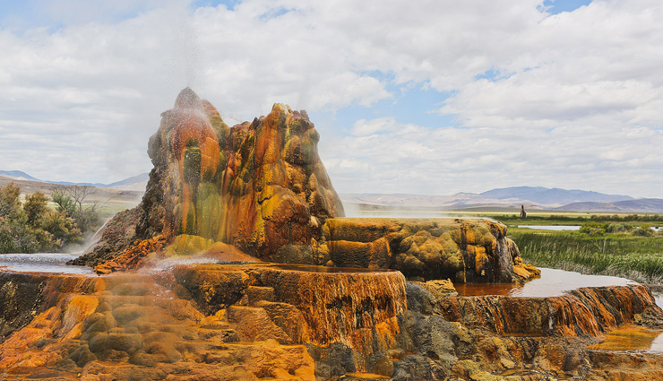 unique places to visit in the world,spotted lake of osoyoos,british columbia canada,chamarel falls and the colored earth,mauritius,rio tinto,spain,fly geyser reno,nevada,vale da lua,brazil,cano cristales,colombia