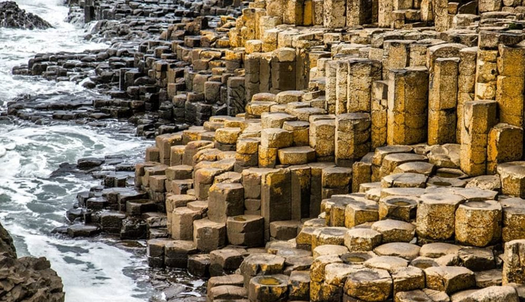 unusual beaches to visit in the world,unusual beaches,giants causeway,near bushmills,northern ireland,glass beach,ft bragg,california,red beach,santorini,greece,maho beach,st maarten,petroglyph beach,wrangell,alaska