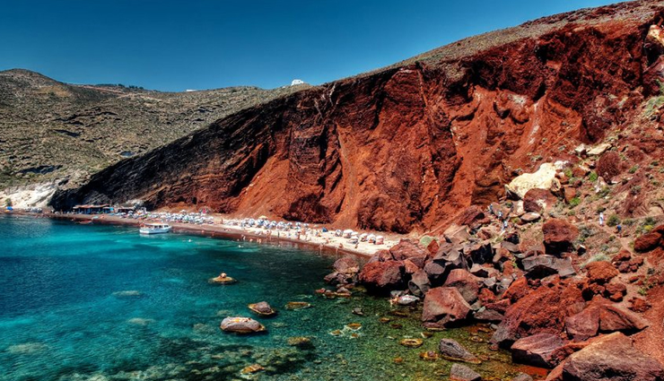 unusual beaches to visit in the world,unusual beaches,giants causeway,near bushmills,northern ireland,glass beach,ft bragg,california,red beach,santorini,greece,maho beach,st maarten,petroglyph beach,wrangell,alaska