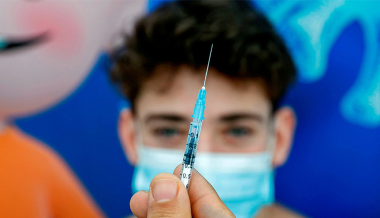 12 से 15 साल के स्वस्थ बच्चों को कोरोना का टीका लगाने की जरूरत नहीं: ब्रिटेन