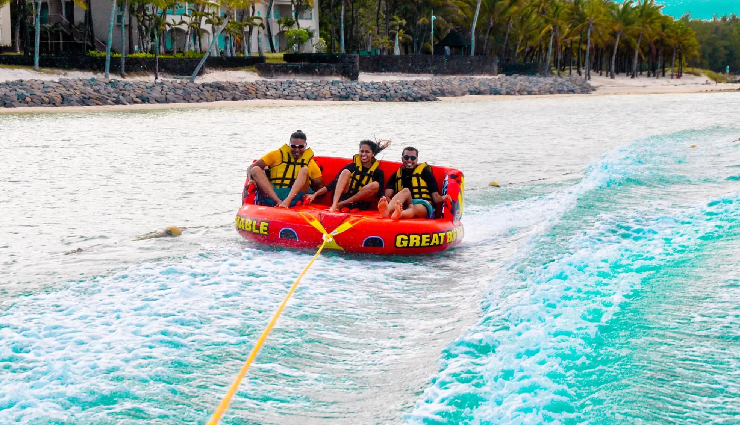 mauritius travel experiences,things to do in mauritius,explore mauritius attractions,adventure activities mauritius,belle mare water sports,deep sea fishing mauritius,le morne brabant hike,grand bassin temples visit,seven coloured earth tour,underwater waterfall helicopter tour