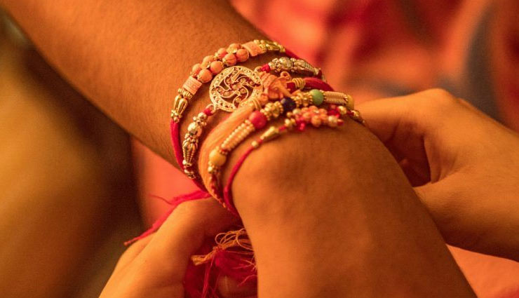 ways to tie rakhi to brother,astrology tips,rakhi 2018