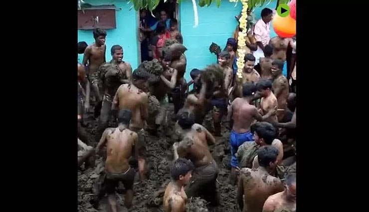 VIDEO- Weird Festival of People Smearing Each Other With Cow Dung Goes Viral