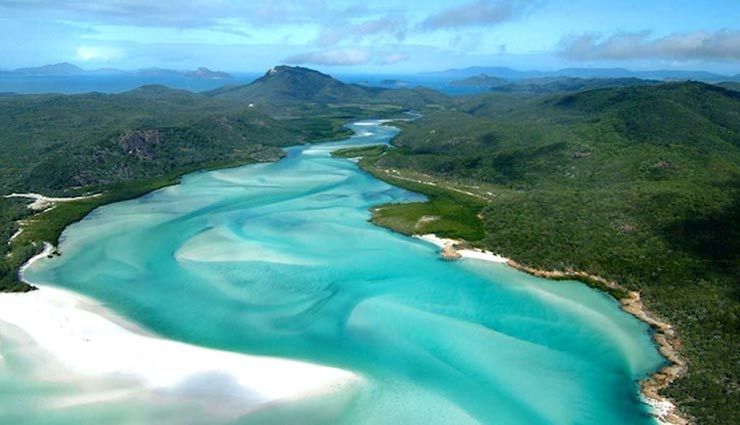 chile,australia,northern ireland,5 breathtaking places to visit once in a lifetime,best places in the world,whitehaven beach,the fairy pools on the isle of skye,scotland,marble caverns of carrera lake,havasu falls,grand canyon national park,the dark hedges