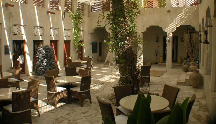 dubai old quarter,the history and tradition of the emirate,visit the gold souk,walk around al bastakiya quarter,admire local art at the xva gallery,visit the coffee museum,have a traditional lunch in an arabic tea house,visit the dubai museum,souvenir shop at the souk,shop at the spice souk,take a one-dirham boat ride across the dubai creek,watch local workers pack the ships with imports and exports,travel,tourism