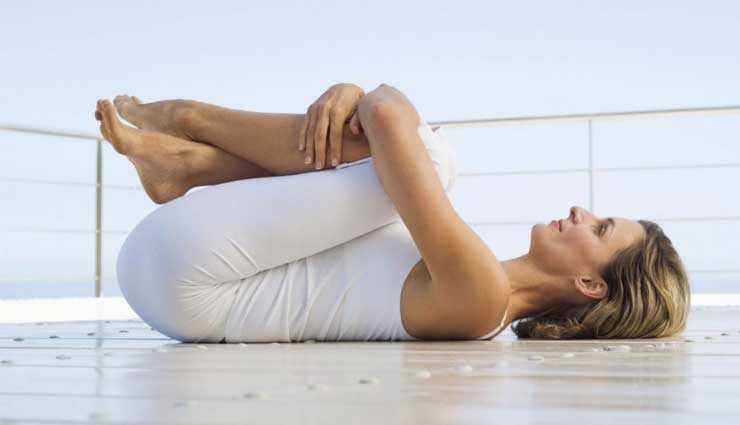 fibromyalgia,yoga asan for fibromyalgia,warrior pose,cobra pose,corpse pose,bridge pose,standing forward bend pose