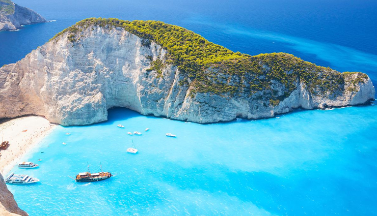 must-visit places greece,top tourist destinations greece,best places to visit in greece,greece travel bucket list,explore greece must-see sites,greek island getaways,ancient ruins and landmarks in greece,unforgettable greek travel experiences,discovering greece hidden gems,greek islands and mainland attractions