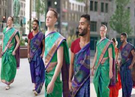 சிகோகா நகரின் தெருக்களில் சேலை கட்டி நடந்து வந்த ஆண்கள்