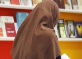 பணியிடத்தில் பெண்கள் தலையில் முக்காடு அணிவது குறித்து பரபரப்பு தீர்ப்பு